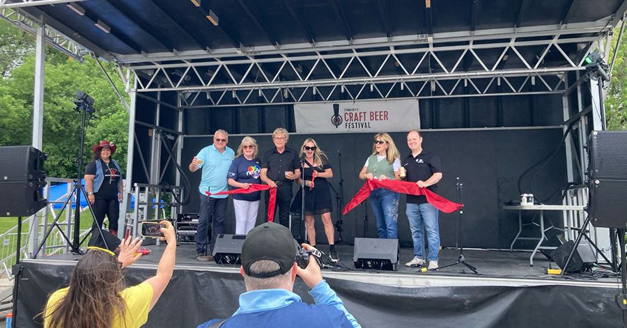 Debora Kelly at the Newmarket Craft Beverage Festival ribbon cutting