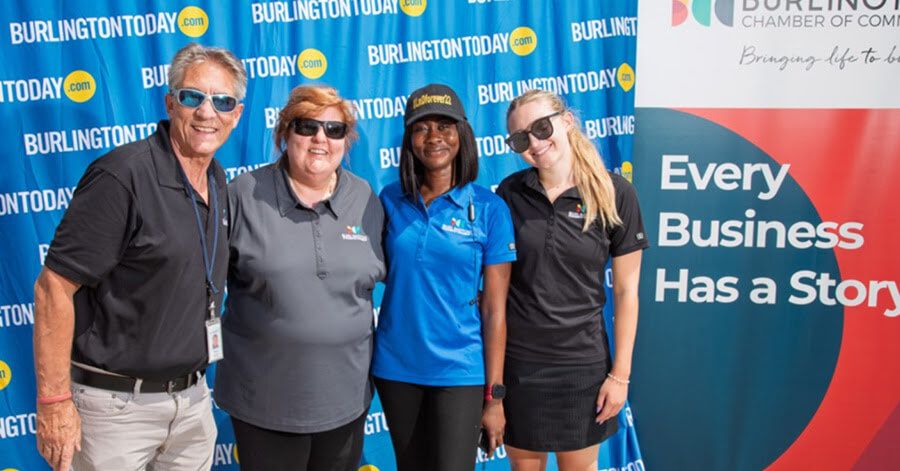 Golfers posing at the 2025 Fore Your Business Golf Classic