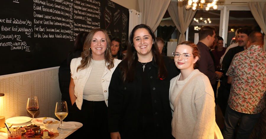 Group of local businesswomen at the Holiday Helpers event