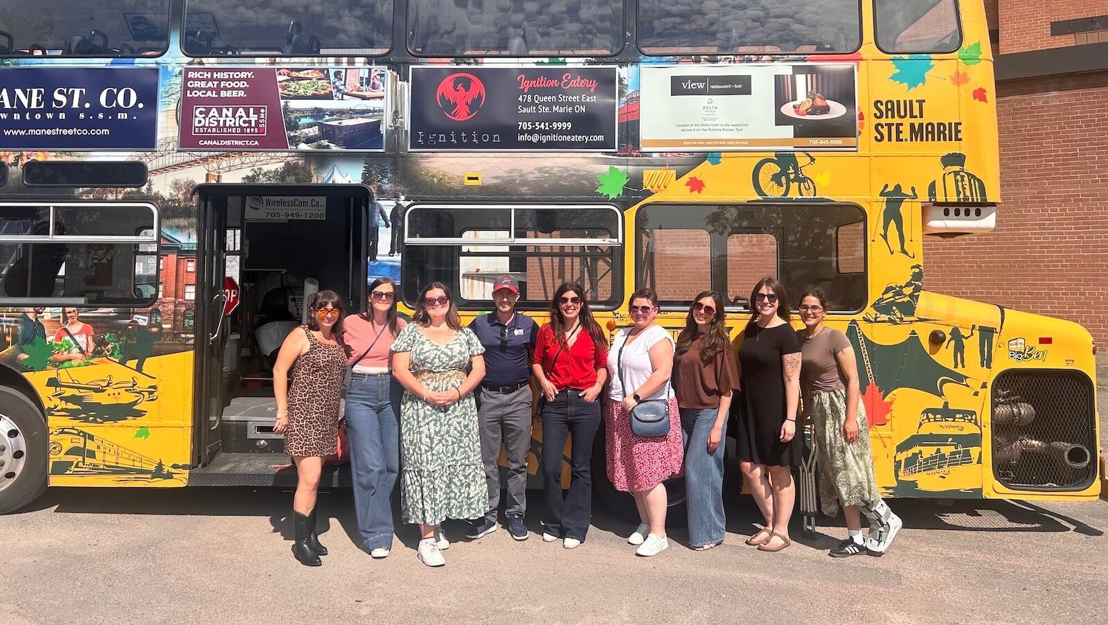 Our marketing/communications team boarding the Big Ben tour bus in downtown Sault Ste. Marie