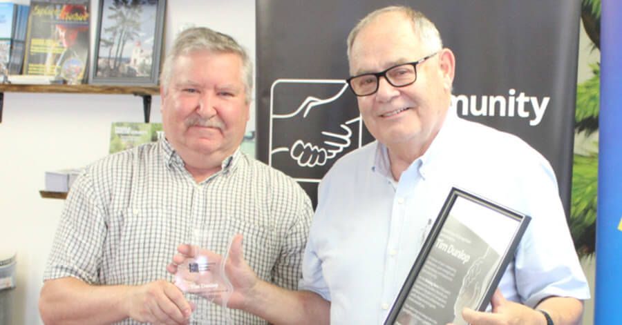 Rick Gordon presented Tim Dunlop with the MidlandToday Unsung Hero Community Builders Award